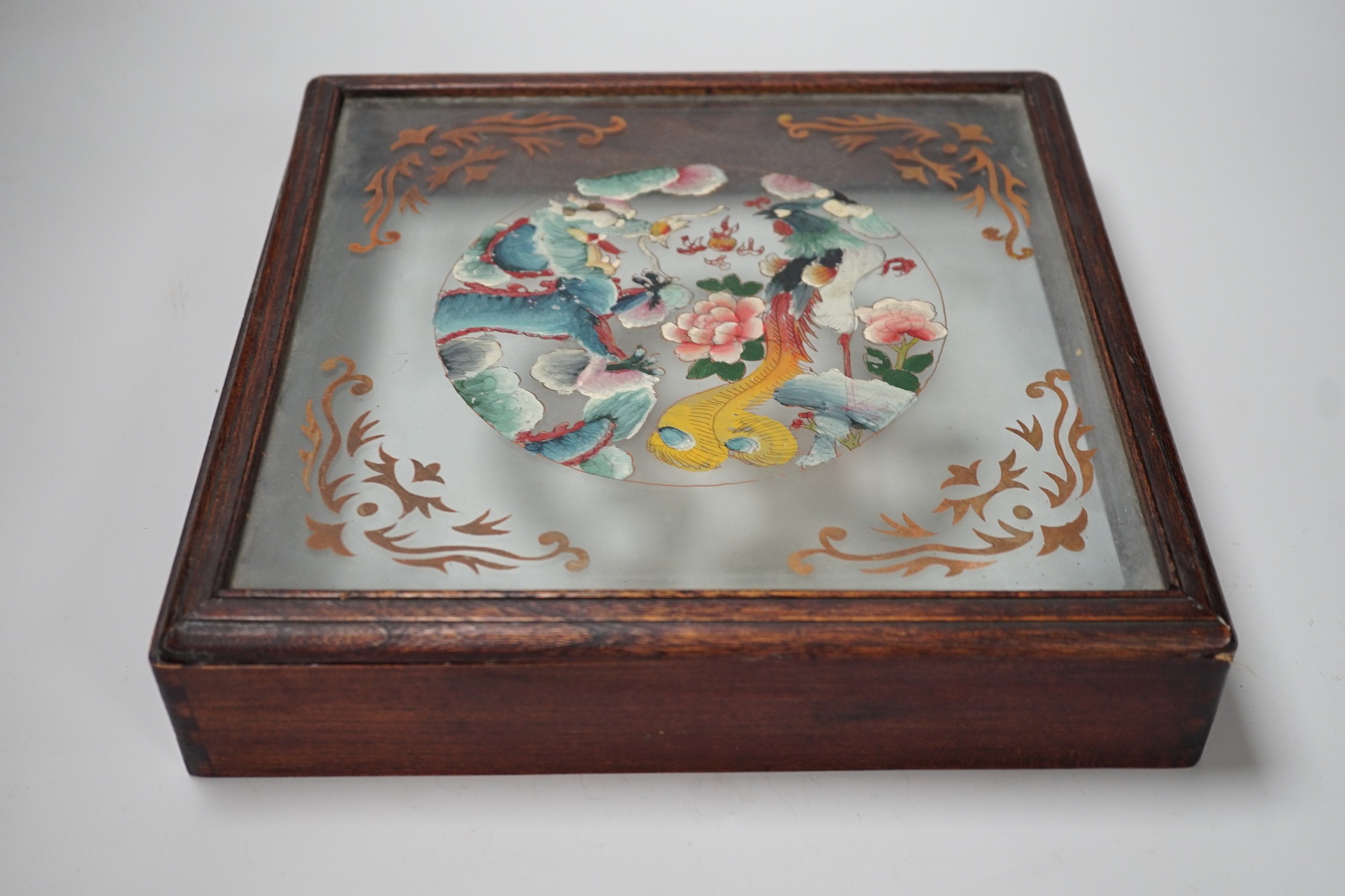 A Chinese reverse glass painting and a box cover with reverse painted glass panel